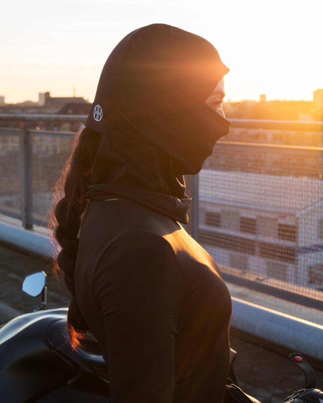Female rider wearing BRAIDFIT BALACLAVA with braid 